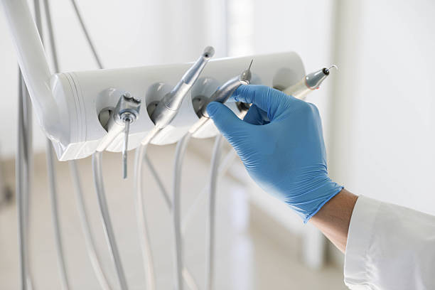 Professional Tooth Extraction technician working in Matthews, NC
